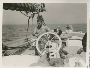 Image of On Board the Thebaud, Russell Welsh at wheel